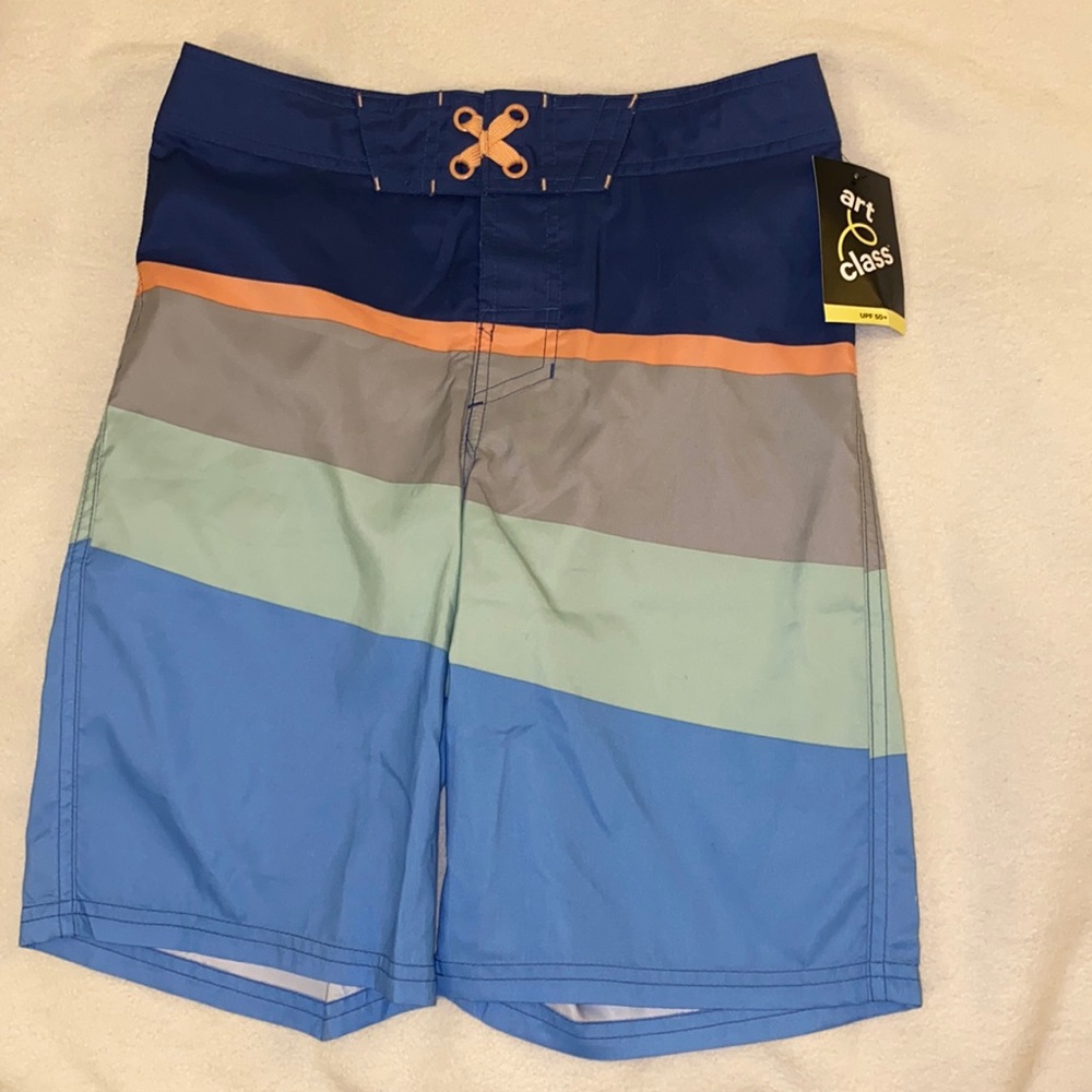 Boys size 12 UPF 50+ swim shorts. Brand new with tags.